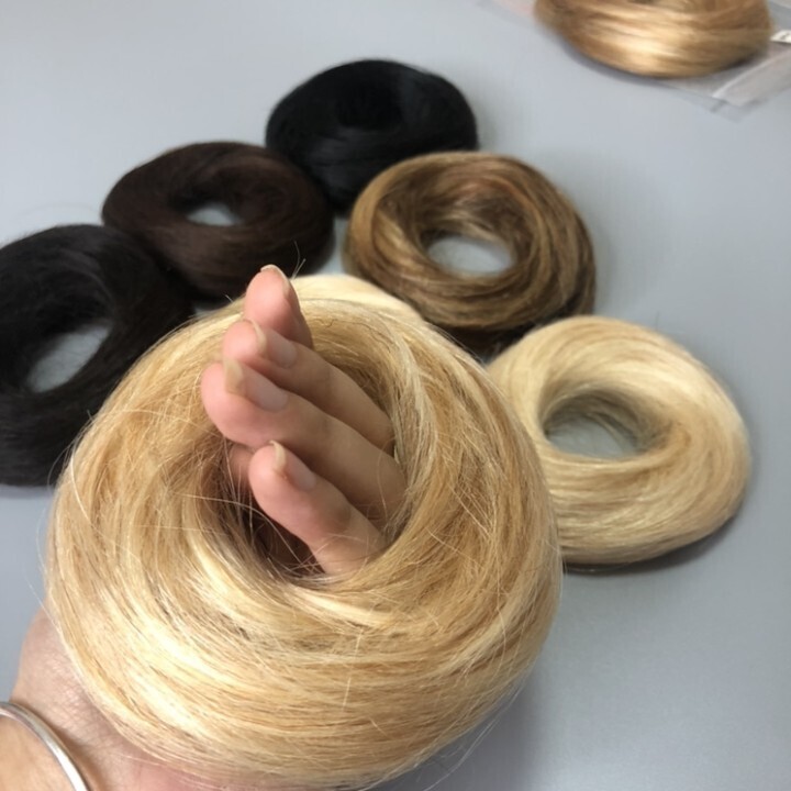 Human hair scrunchie with rubber band hair ring wrap on bun extensions