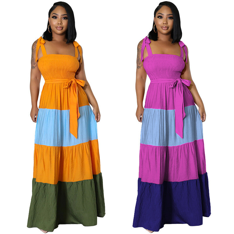 Sleeveless bandage color block maxi dress with belt, featuring a halter neckline and colorful stitching at the waist;