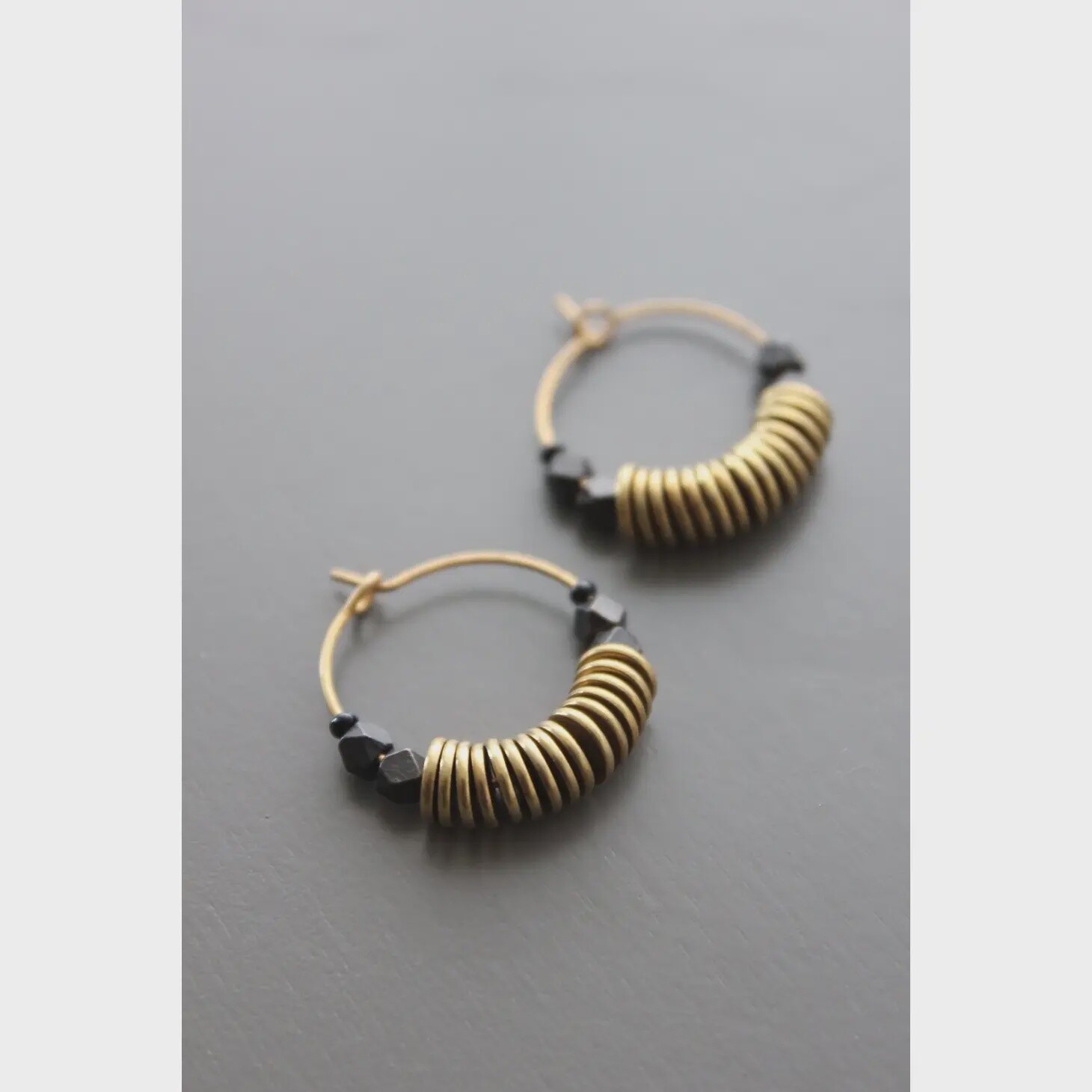 Brass discs and hematite hoop earrings