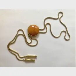 Ochre Swirled Lucite Circle Snake Chain Bolo