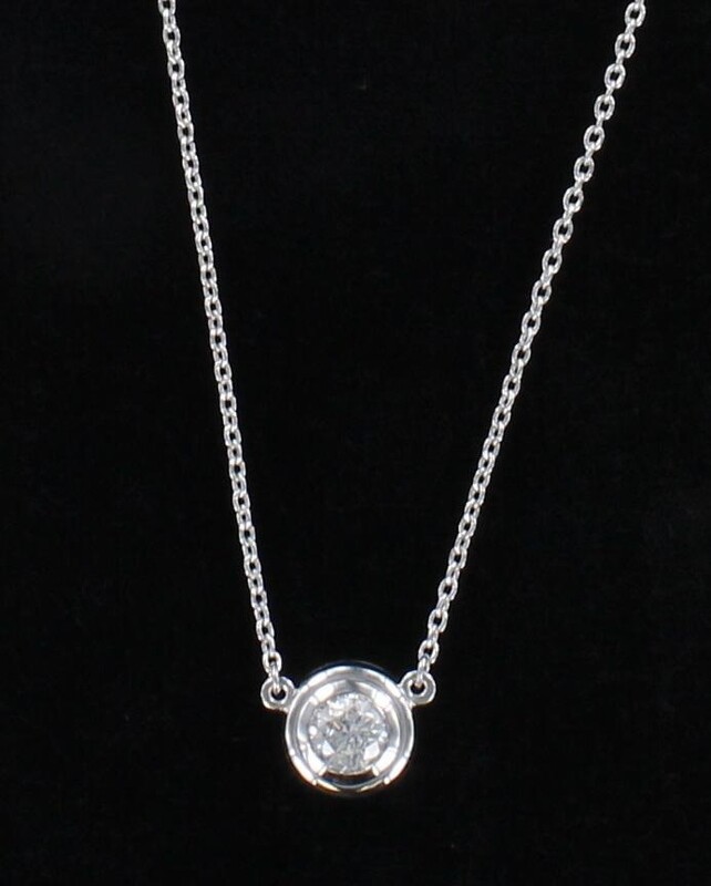 14KT .70 CT ROUND BEZEL SET DIAMOND NECKLACE 14KT .70 CT ROUND BEZEL SET DIAMOND NECKLACE