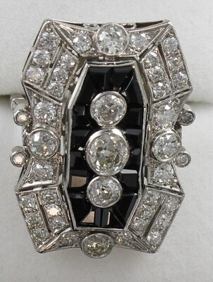 PLATINUM ART DECO ONYX AND DIAMOND RING PLATINUM ART DECO ONYX AND DIAMOND RING