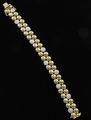 18KT YELLOW AND WHITE GOLD DIAMOND BRACELET 18KT YELLOW AND WHITE GOLD DIAMOND BRACELET
