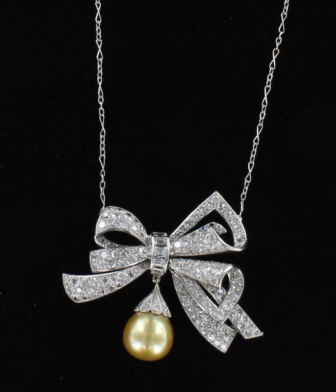 PLATINUM DIAMOND BOW WITH GOLDEN PEARL NECKLACE PLATINUM DIAMOND BOW WITH GOLDEN PEARL NECKLACE