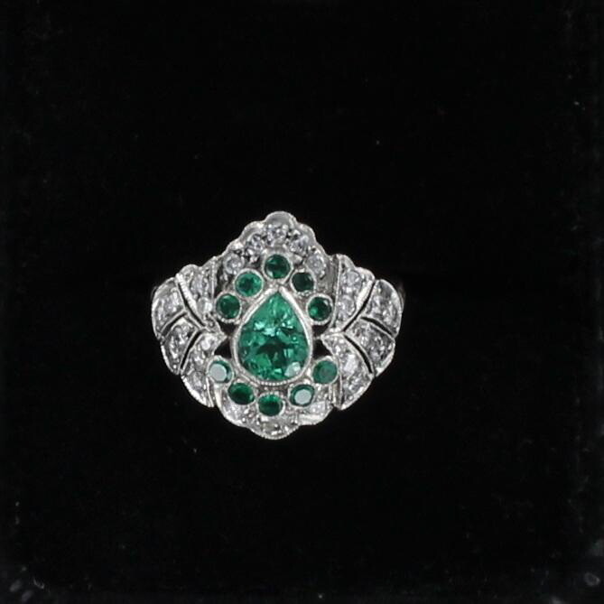PLATINUM EMERALD AND DIAMOND RING