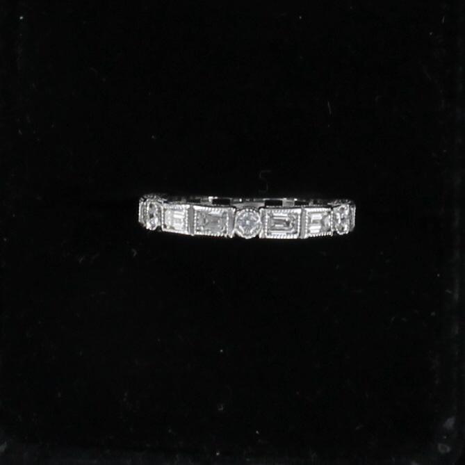 14KTW BAGUETTE AND ROUND BRILLIANT ETERNITY BAND, SZ 6.25