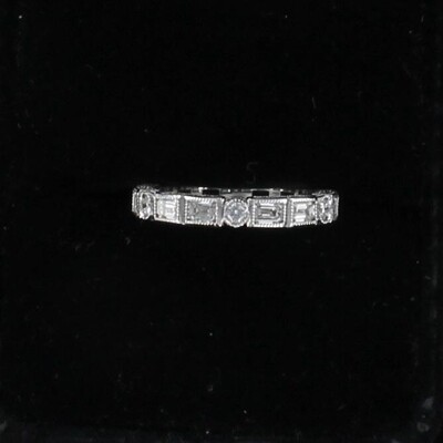 14KTW BAGUETTE AND ROUND BRILLIANT ETERNITY BAND, SZ 6.25