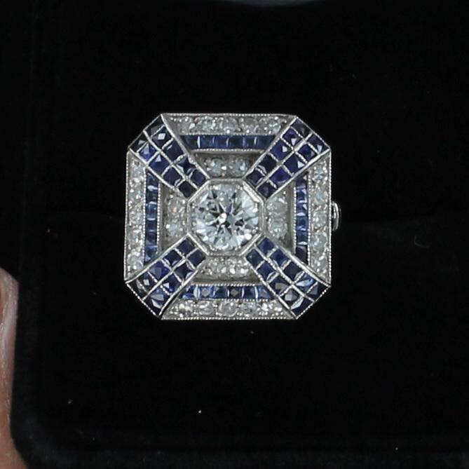 PLATINUM 1.0 CT CENTER DIAMOND AND SAPPHIRE RING