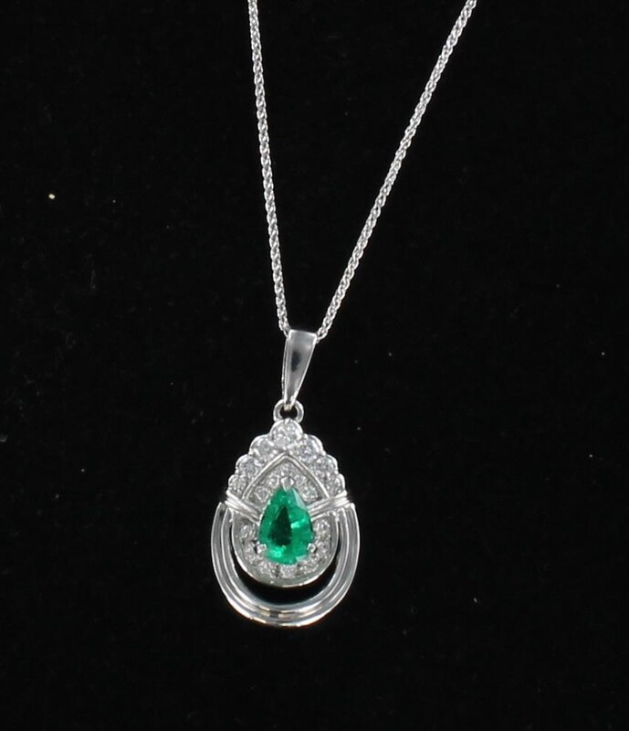 PLATINUM PEAR SHAPED EMERALD WITH DIAMOND PENDANT