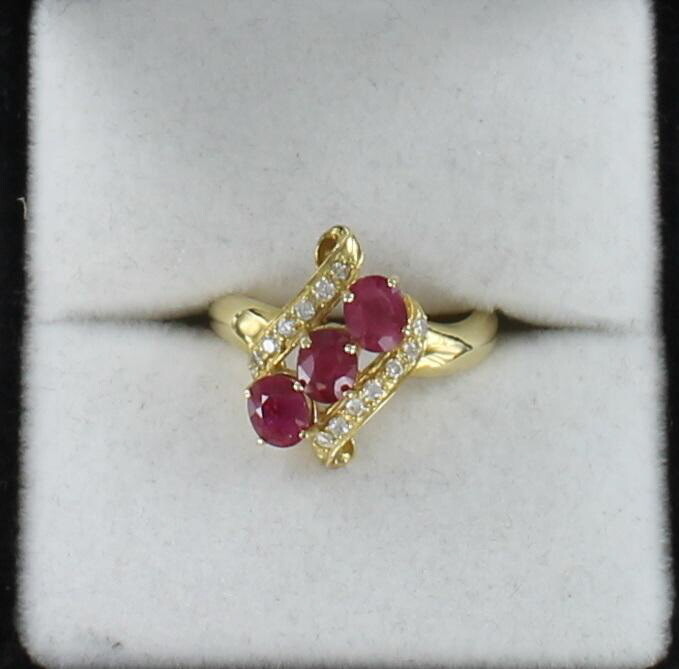 14KTY RUBY AND DIAMOND RING