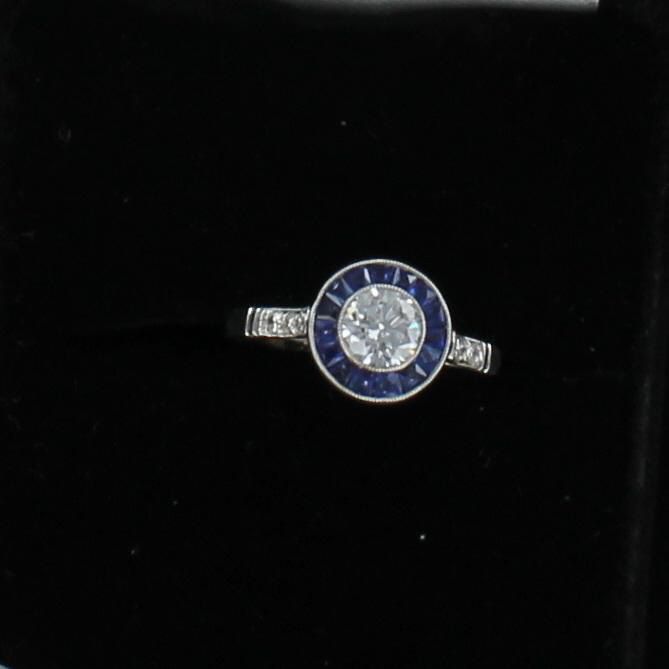 PLATINUM .64 CT ROUND DIAMOND SAPPHIRE RING