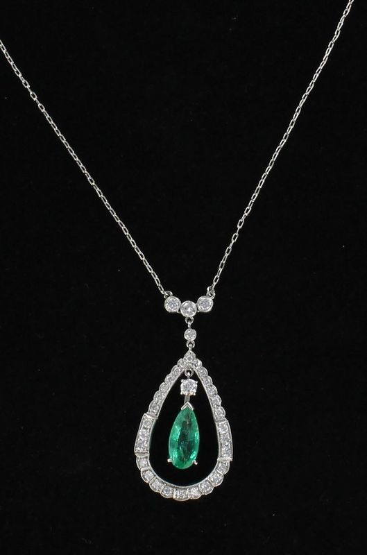 PLATINUM EMERALD AND DIAMOND PENDANT