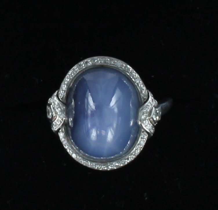 PLATINUM 24.45 CT STAR SAPPHIRE WITH .38 CT TW DIAMOND RING
