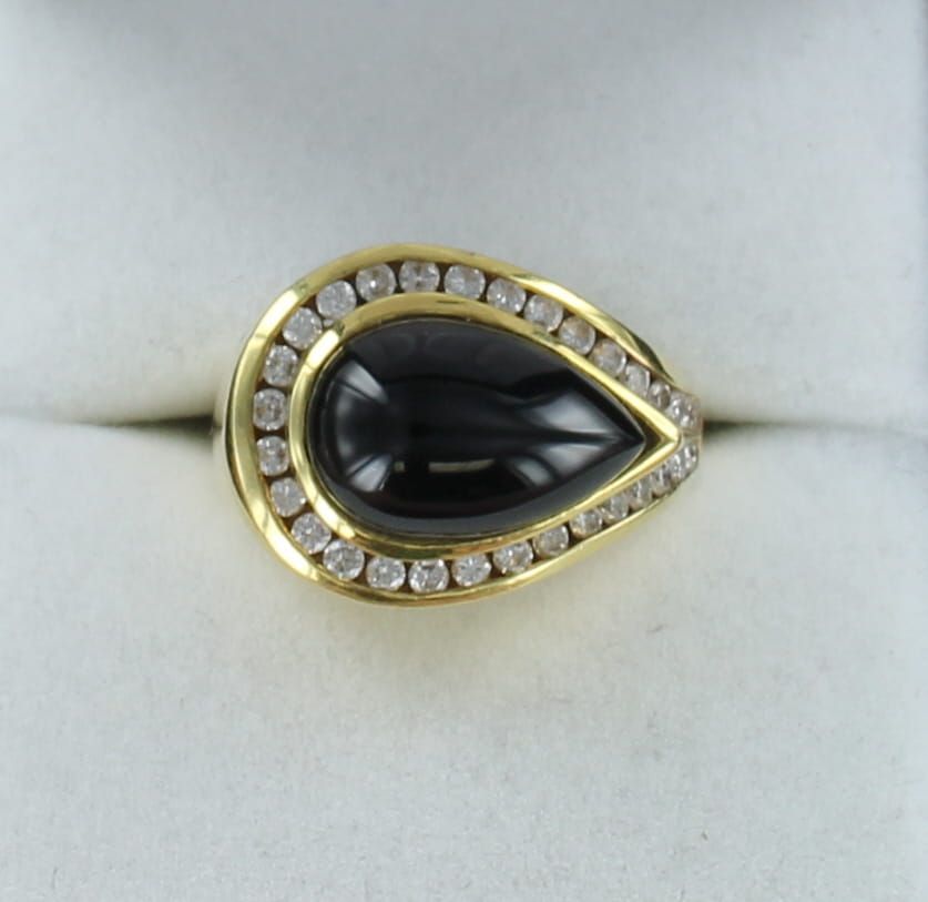 18KTY ONYX AND DIAMOND RING