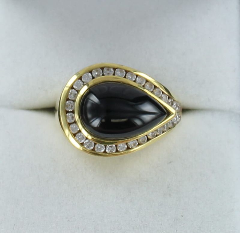 18KTY ONYX AND DIAMOND RING