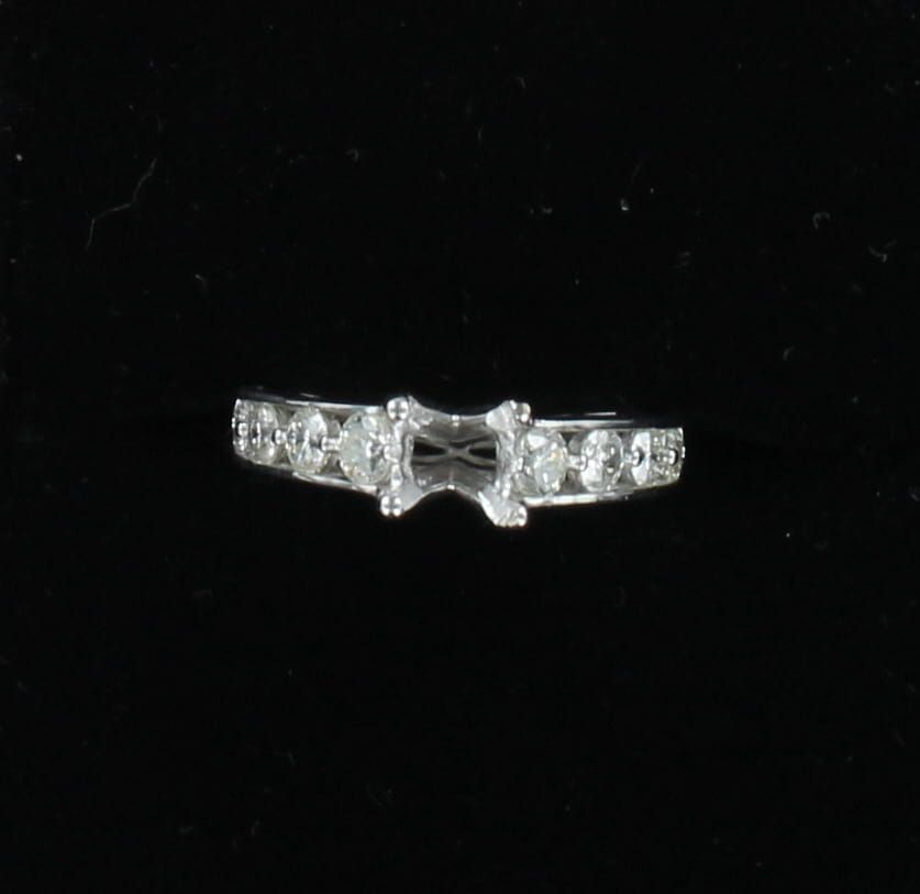 14KTW .70 CT TW ROUND BRILLIANT DIAMOND CHANNEL SET MOUNTING
