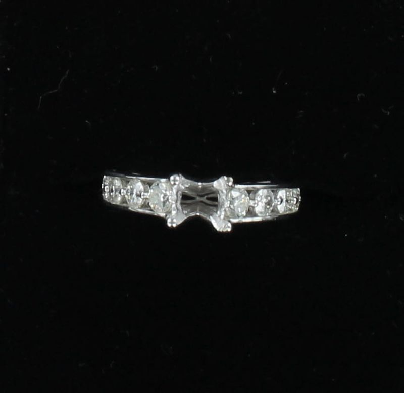 14KTW .70 CT TW ROUND BRILLIANT DIAMOND CHANNEL SET MOUNTING