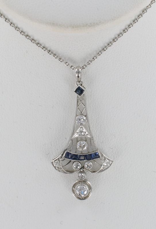 PLATINUM ART DECO .70 CT TW DIAMOND WITH SAPPHIRE PENDANT. CA 1920&#39;S