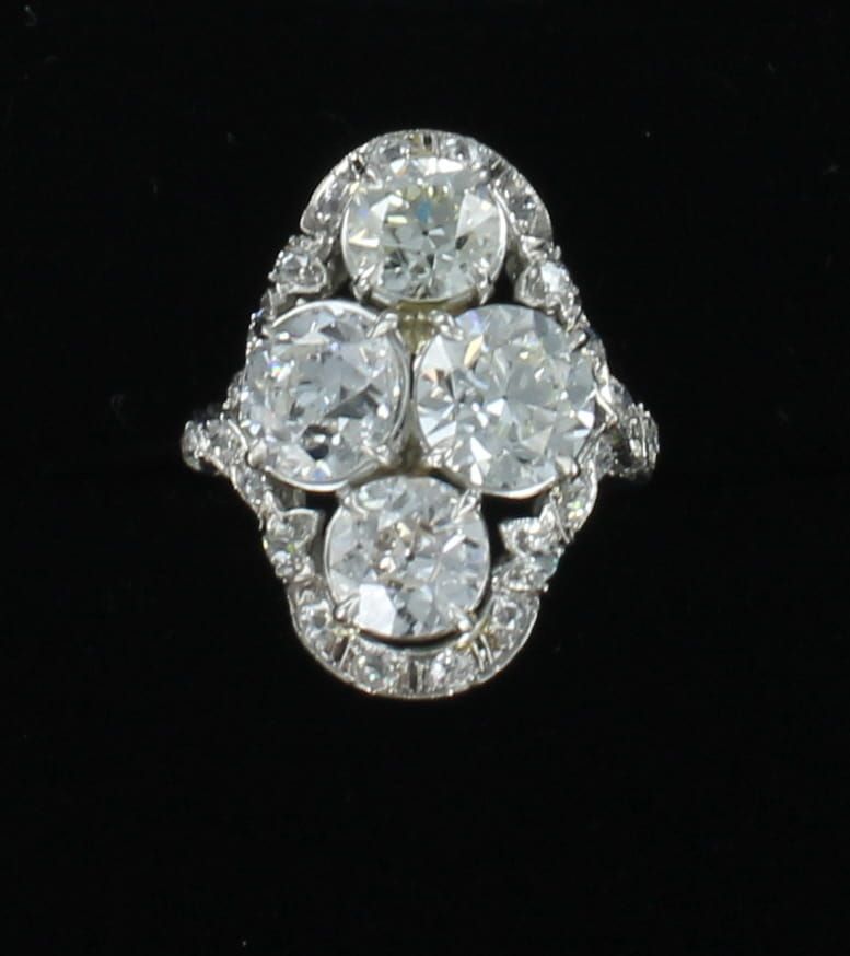PLATINUM EDWARDIAN 7.43 CT TW OLD EUROPEAN CUT DIAMOND RING, CA 1920'S