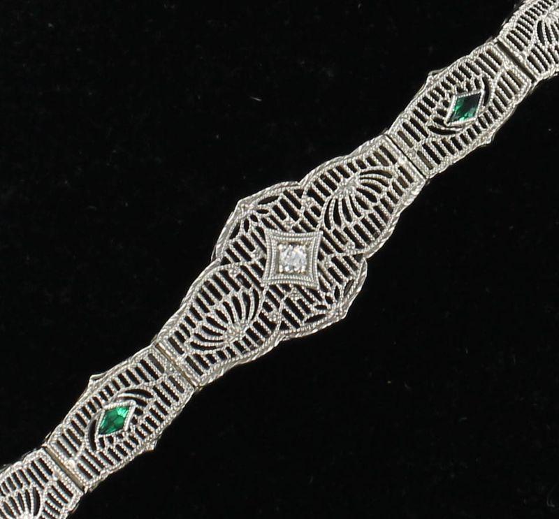 10KTW FILAGREE DIAMOND WITH EMERALD BRACELET, CA 1920