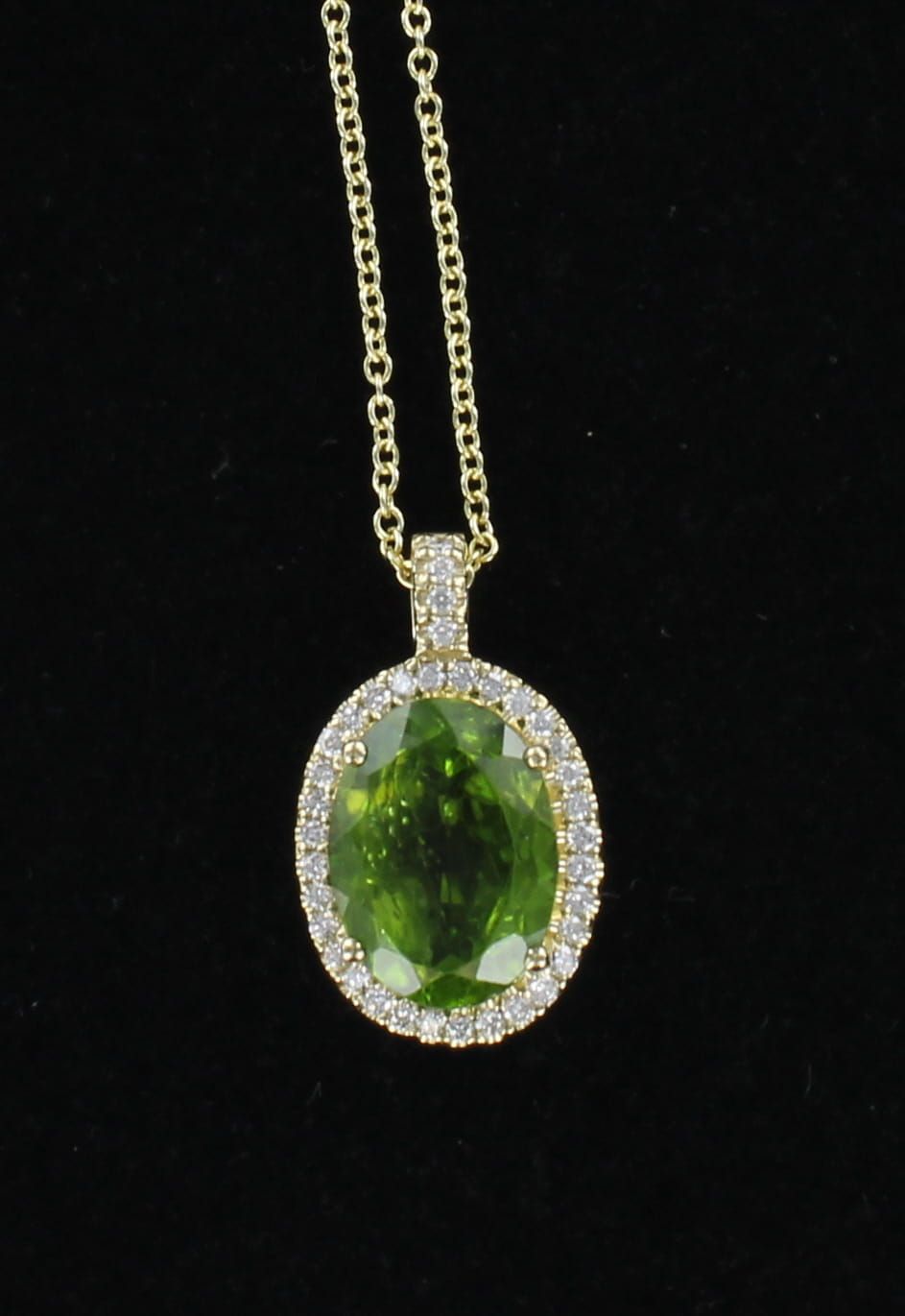 14KTY 10.35 CT PERIDOT WITH DIAMOND PENDANT