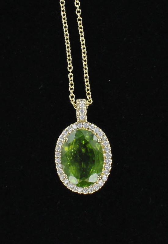 14KTY 10.35 CT PERIDOT WITH DIAMOND PENDANT