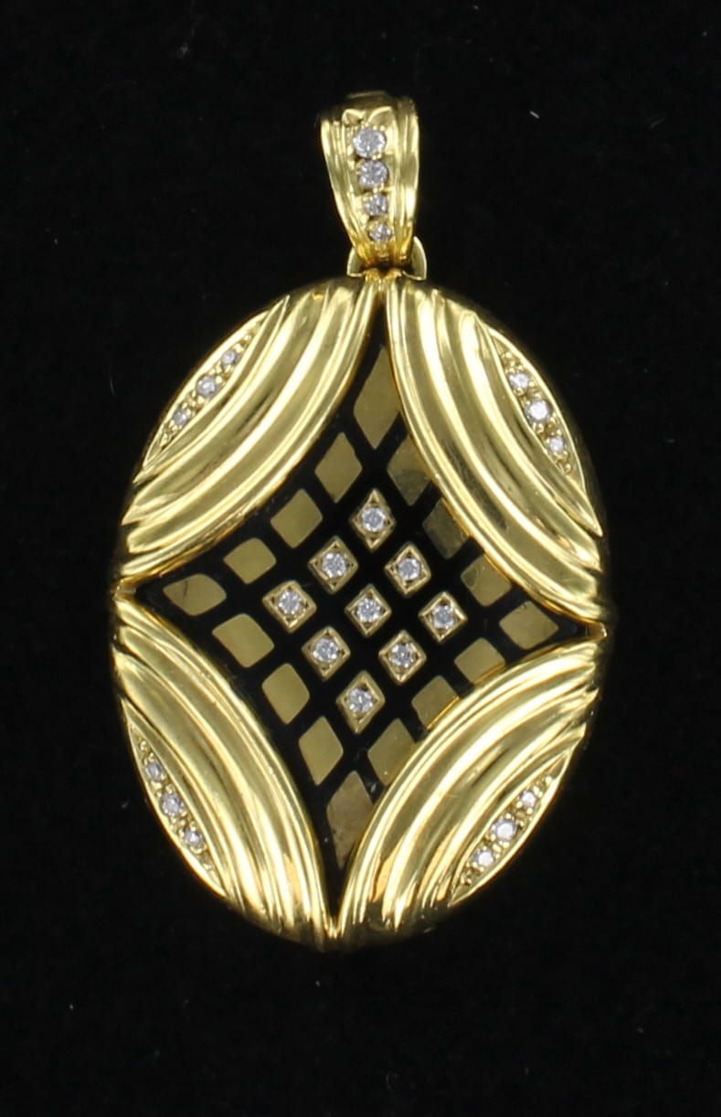 18KTY ENAMEL WITH DIAMOND LOCKET