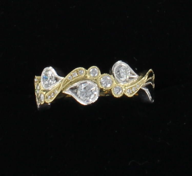 14KT/T .86 CT TW ROUND BRILLIANT DIAMOND RING