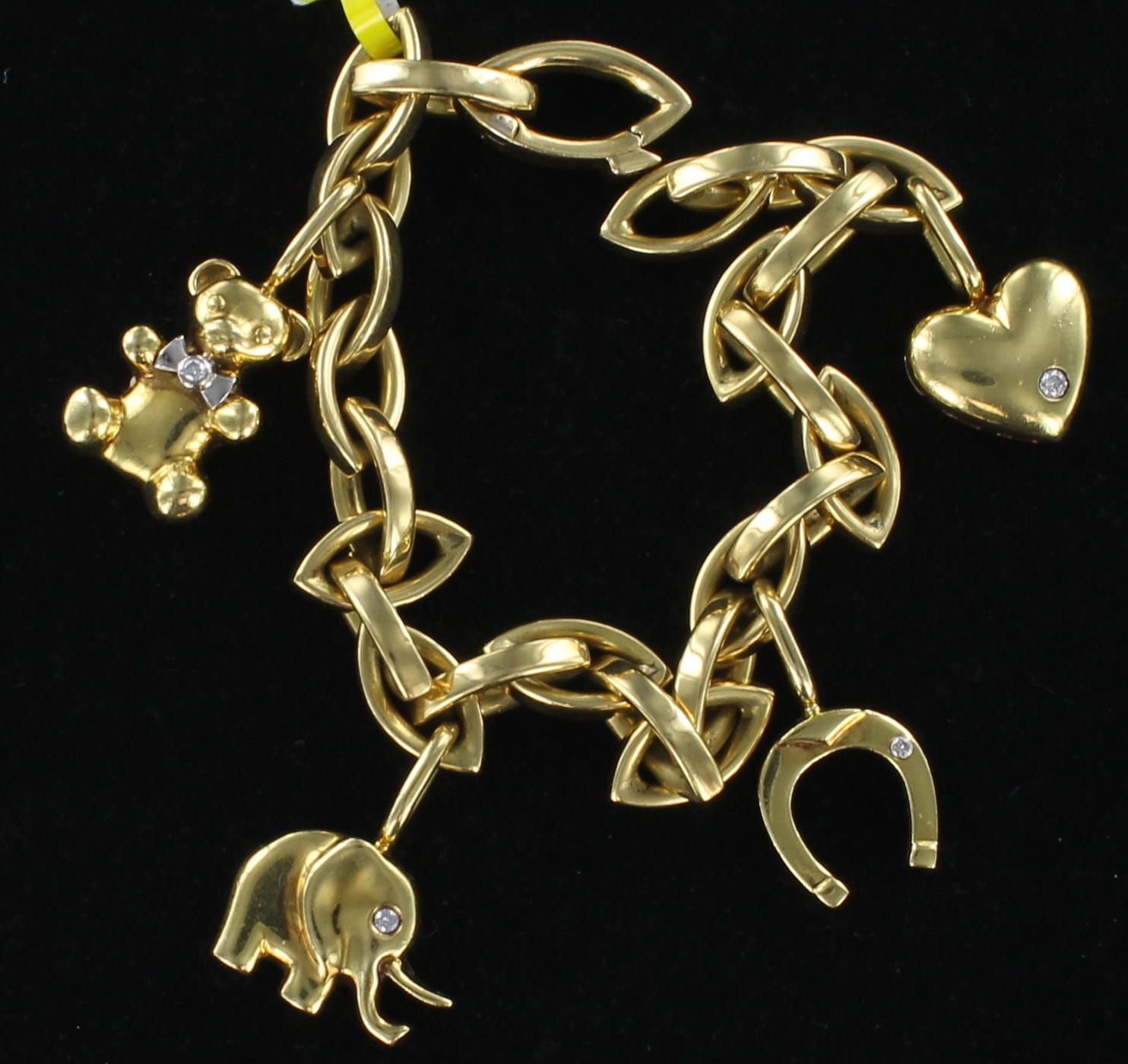 18KTY CHARM BRACELET