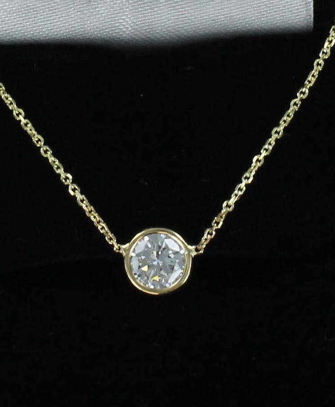 14KTY 1.09 CT ROUND BRILLIANT BEZEL SET DIAMOND PENDANT