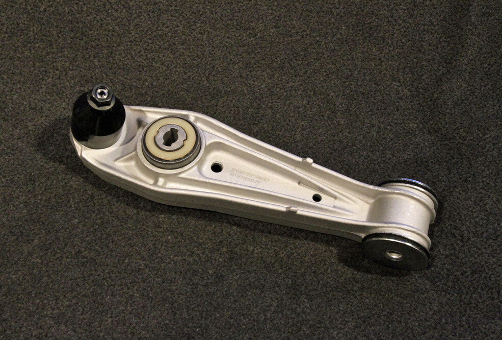 OEM front control arm