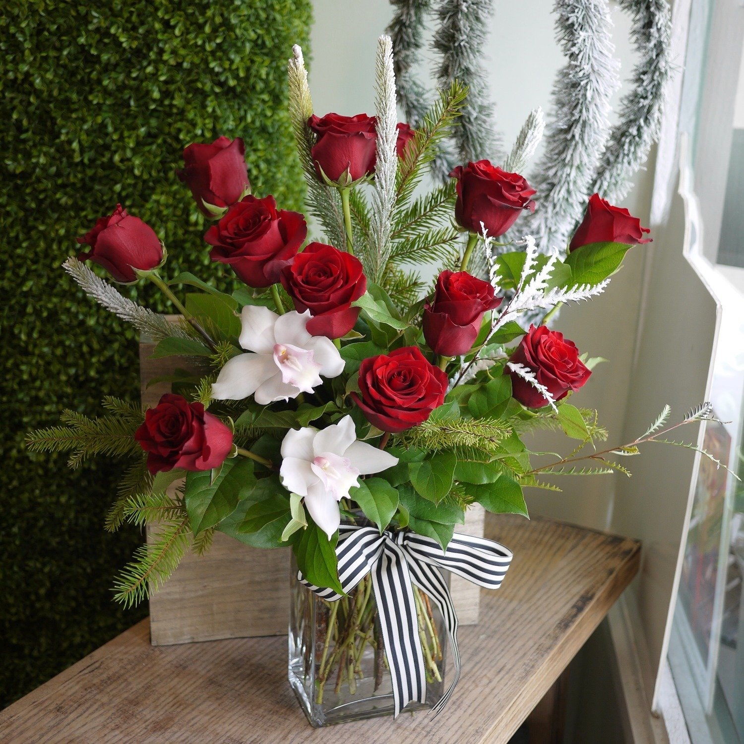 Red Roses with Snow branch