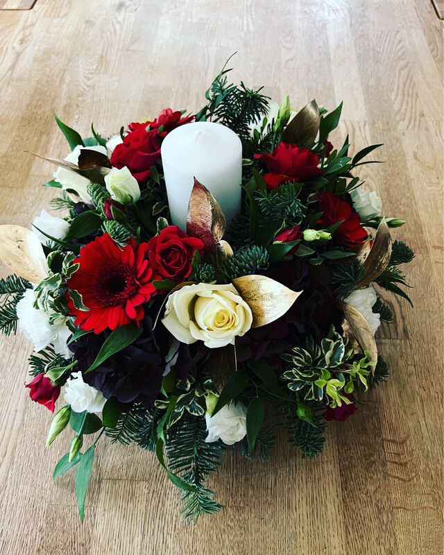 Christmas posy with church candle