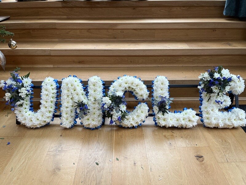 UNCLE funeral Lettering