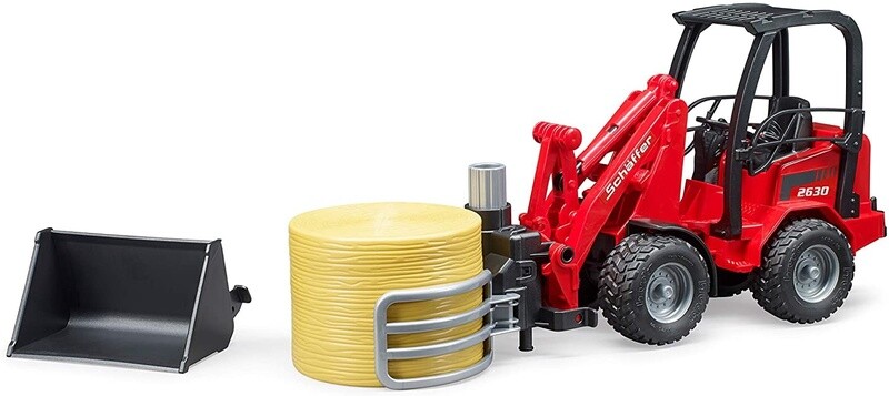 02192 Schaeffer Compact loader 2034 w bale gripper and bale