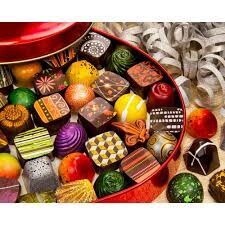 3320498 PD 2000PC PUZZLE-TIN OF TREATS