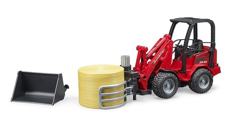 02192 Schaeffer Compact loader 2034 w bale gripper and bale