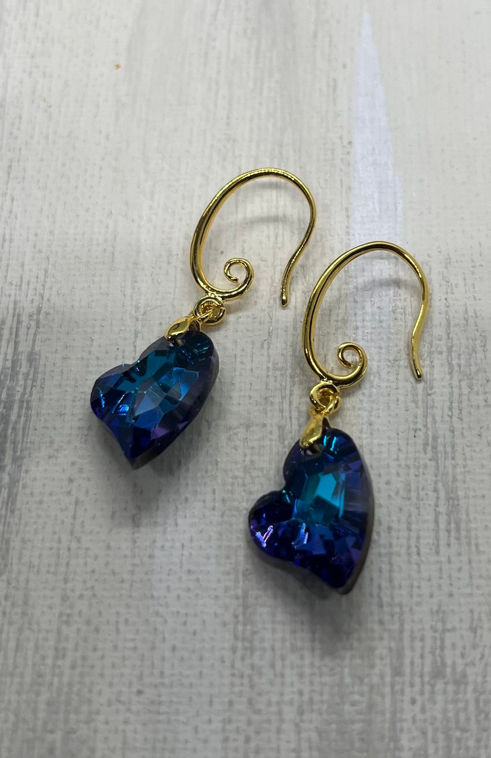 Iridescent heart shaped drop earrings
