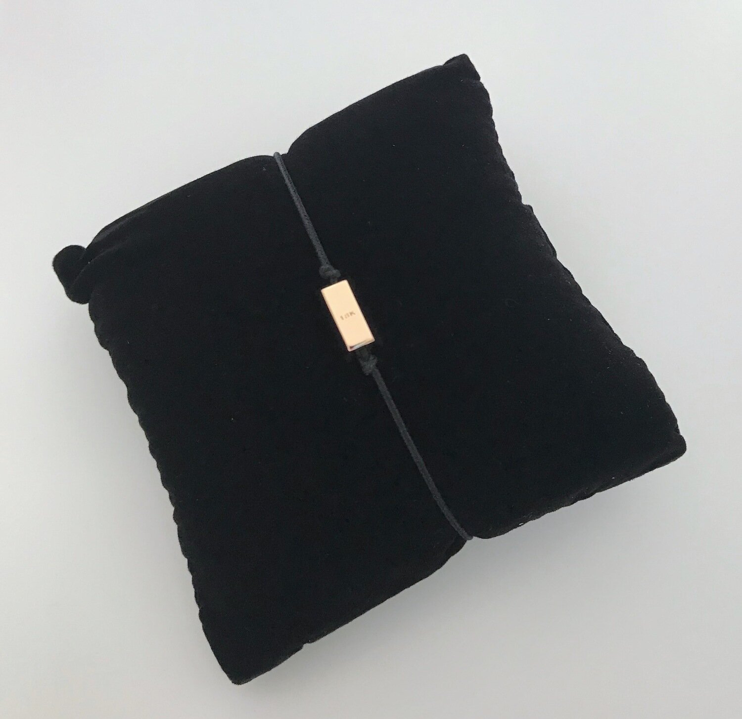 Bracelet lingot or rose 18k 750/1000 sur cordon noir