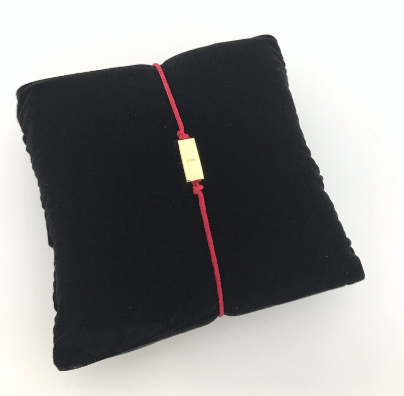 Bracelet lingot or jaune 18k 750/1000 sur cordon rouge