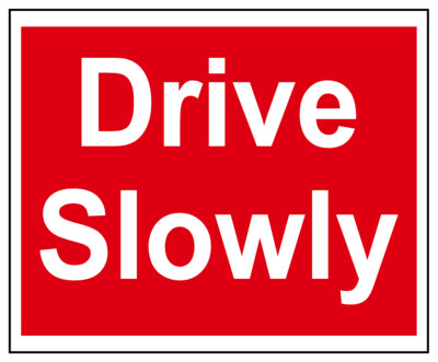 Drive Slowly​ Sign
