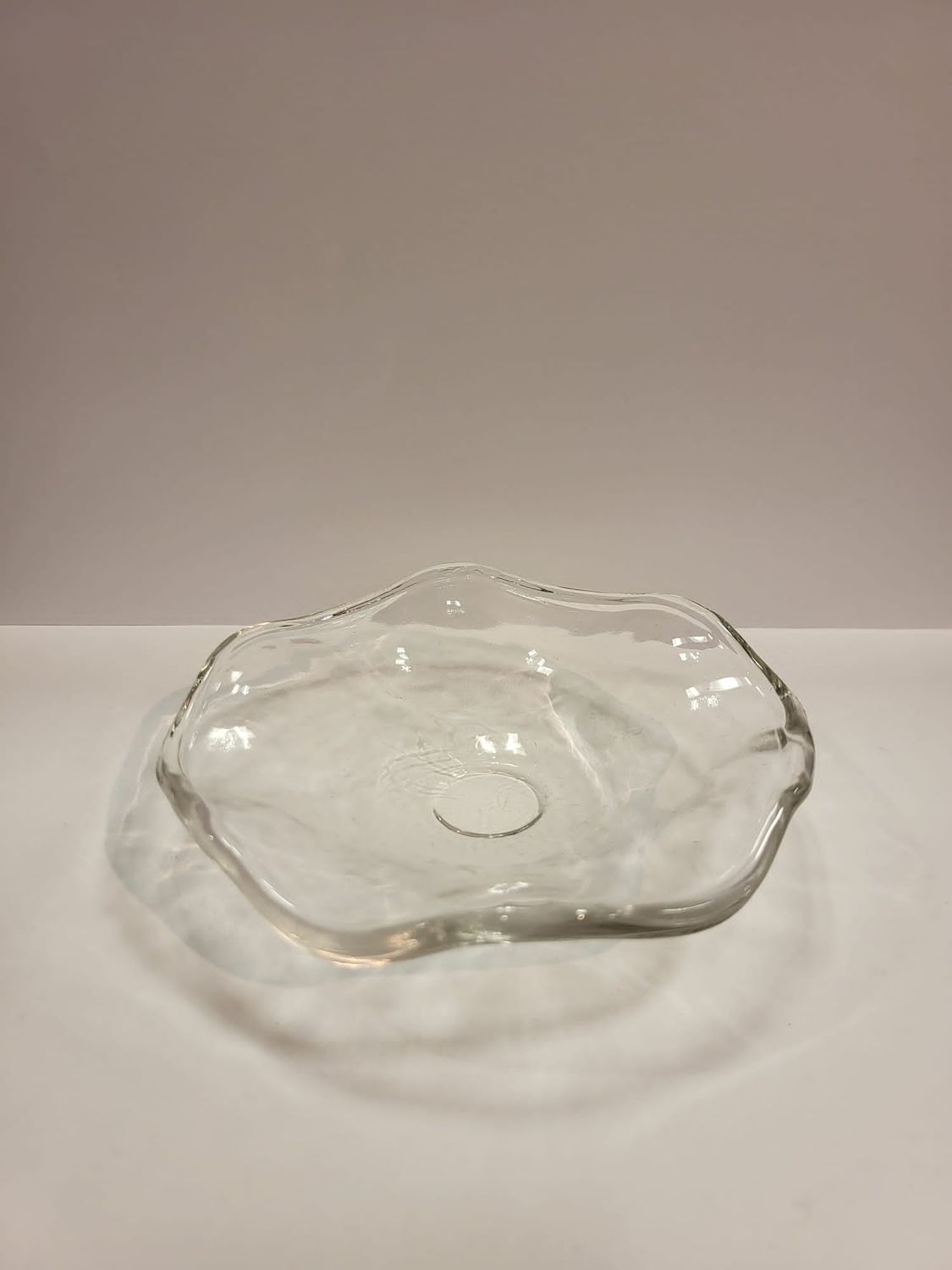 Picture of a thick wavy glass replacement bowl for an aroma lamp.