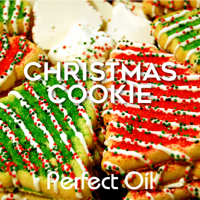 Picture showing striped, red, green and white iced Christmas tree shaped cookies with sprinkles with the words Christmas cookies and Perfect Oil on top of the image. 