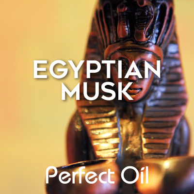 Picture showing a gold pharaoh statue on a golden background with two gold bowls in the foreground and the words Egyptian musk and Perfect Oil in white on top of the image itself. 