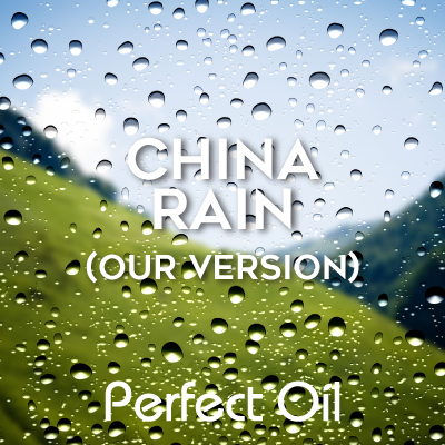 Picture showing raindrops on a lens looking at grassy hills and mountains and the words China rain our version and perfect oil in white on top of the image.