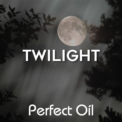Picture showing a view of a full moon through some trees on a moonlit night with the words twilight and Perfect Oil in white on top of the image itself. 