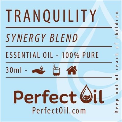 Picture showing a light blue label with a white drop logo on the right side with the words: tranquility, synergy blend, essential oil - 100% pure, 30 ml, perfect oil and perfectoil.com on consecutive lines. The line showing 30 ml also shows the drop landing in a hand icon for topical, a diffuser icon representing diffusing and a house icon representing home usage. The words: keep out of reach of children are shown on the far right vertically reading from bottom to top. 