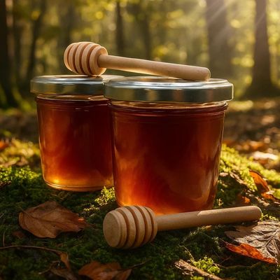 2 frascos con miel 3.5 onzas  + 2 palitos mieleros 3 pulgadas