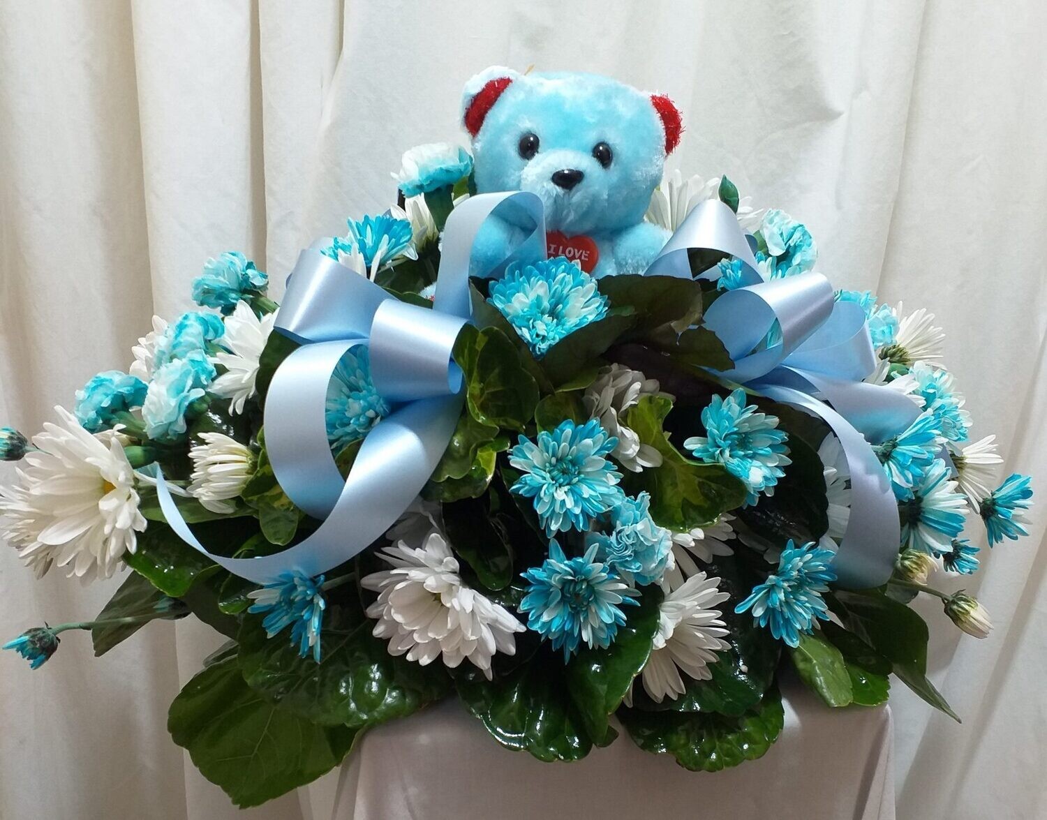 Wreath with a teddy bear for a child