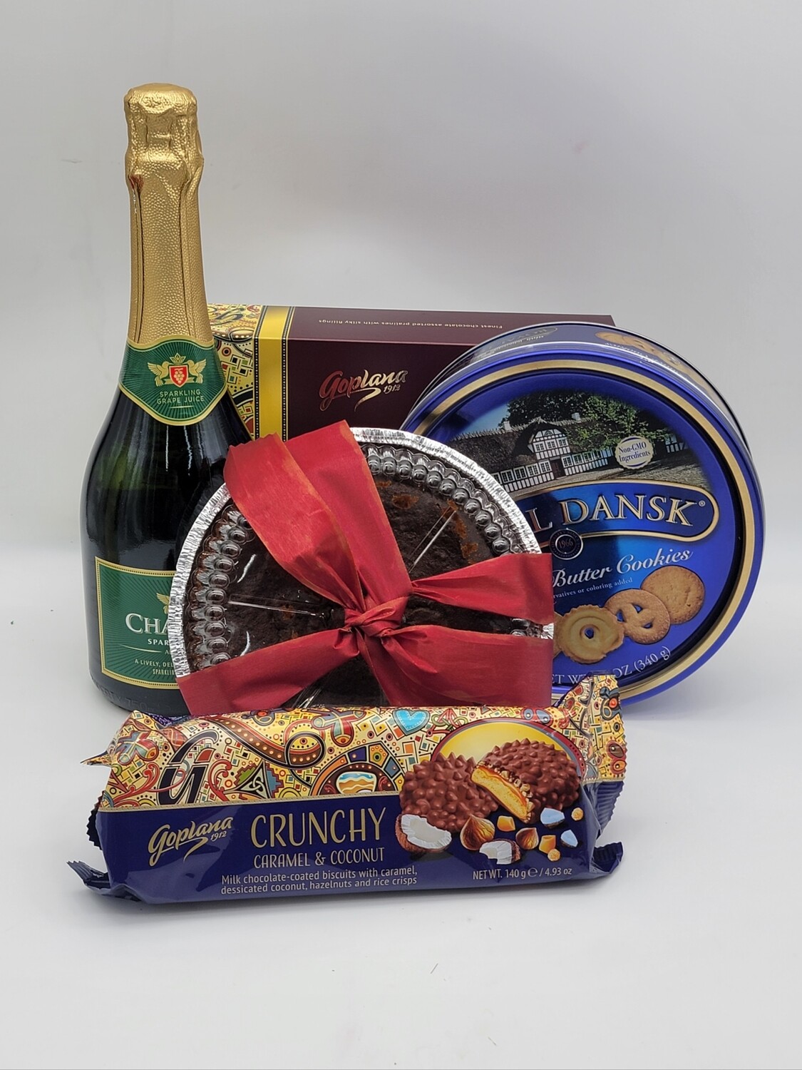 Chocolates, Cookies, Non alcoholic Wine, round Xmas cake,  Chocolate Covered Biscuits 
